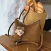Bolsos Retro Otoño e Invierno para Mujer 2025 Nuevo Bolso de Hombro y Axila de Gamuza de Gama Alta Bolso Casual para el Trabajo Bolso Almohada