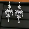 Aretes de aguja plateada con borlas de flor de zirconia, accesorio festivo elegante y único, aretes de lujo ligero y de alta gama