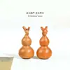 Venta al por mayor de fabricante de calabaza con cabeza de dragón de madera de azufaifo jadeada, calabaza con cabeza de dragón tallada en madera de azufaifo, adornos de mano, piezas decorativas y coleccionables