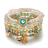 Pulseira de braceletes bestseller transfronteiriça estilo boêmio com pingente de coração, palma e olho grego, pulseira de cordão elástico multicamadas