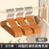 Colgador de plástico grueso con recubrimiento nuevo estilo extra grueso para adultos plástico con recubrimiento antideslizante sin marcas colgador de ropa colgador de ropa para niños