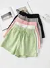 Comercio exterior al por mayor shorts de color liso para mujer verano finos holgados talla grande cintura alta rectos pierna ancha ocio deportes pantalones cortos ajustados