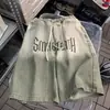 Marca de moda de calle americana, shorts de mezclilla marrones degradados con cordón para hombre, pantalones retro holgados de 5 puntos, estilo fino de verano