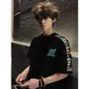 Camiseta de manga corta de estilo americano de moda para hombre, bordada con letras de marca, corte holgado, ropa de verano para parejas, top versátil para adolescentes y estudiantes