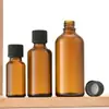 Botella de aceite esencial Amazon color café con tapa de giro a prueba de niños, gotero con punta de goma, botella rellenable para cosméticos y sueros, botella vacía