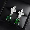 Venta directa de fábrica aretes de flor de 3 pétalos con circonita AAA aretes exquisitos europeos y americanos aretes de novia en stock lote mixto e6496