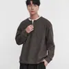 Suéter de cuello redondo de imitación de dos piezas para hombre, estilo otoño e invierno, marca trendy americana, estilo casual, tejido de punto para capa interior de pareja