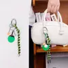 Colgantes para bolsas de resina, accesorios decorativos para fiestas y reuniones, colgantes para bolsas y llaveros al por mayor