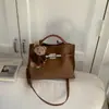 Bolsa Pequena Retro Transfronteiriça para Mulheres 2026 Nova Coleção de Primavera Versátil Bolsa de Mão para o Dia a Dia Bolsa Saco Bolsa de Ombro Transversal Texturizada