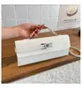 Bolsa Transversal para Mulheres 2026 Novo Modelo High-End Retrô Cor Sólida Pequena Quadrada Versátil Ombro Transversal Pequena Quadrada