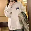 Sudadera estilo americano oversized con cuello redondo para mujer, de corte holgado, diseño único, forro polar, sin capucha y de longitud media, estilo pull-over - una prenda de moda
