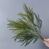 Plantas verdes artificiales en stock, manojos de helecho, hojas de helecho, hierba de helecho para decoración de paredes interiores y diseño de paisajes, césped artificial al por mayor