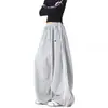 Pantalones de chándal deportivos de retazos a rayas para mujer y hombre, pantalones de baile holgados de pierna ancha para otoño, pantalones versátiles y adelgazantes de largo completo