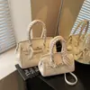 Bolso Platino de Gran Capacidad Bolso de Mujer Patrón Granulado Simple Elegante Bolso de Hombro Estilo Extranjero Versátil Cerradura Bolso Cruzado Portátil