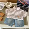 Camisa de estilo japonés para niños 2026 verano nuevo estilo niños manga corta dibujos animados rayas top bebé casual dibujos animados versátil