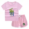 Conjunto de Camiseta e Shorts de Gola Redonda de Verão 2026 para Crianças Estilo Coreano Casual Absorvente de Suor Cor Doce Conjunto de Moletom para Crianças Pequenas