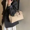 Bolsa Maleta Retrô de Camurça para Mulheres Outono e Inverno 2025 Nova Tendência Moda Coreana Bolsa Tote Simples de Grande Capacidade