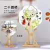 Venta al por mayor de fábrica Yangzhou lugar escénico wenchuang pintura flotante reloj de pared para fichar recuerdo turístico abanico de papel de arroz con borla