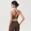 Traje deportivo para mujer para principios de otoño de 2026, con un hermoso diseño en la espalda, shorts de fitness de secado rápido, ropa de yoga para entrenamiento de alta intensidad y top tipo camisola