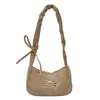 Bolso plisado con bordado de lazo para mujer 2026 Nuevo estilo japonés versátil para llevar debajo del brazo o al hombro bolso cruzado de pana para mujer