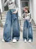 Pantalones para Niñas para Primavera y Otoño 2026 Nuevo Estilo Pantalones Largos de Mezclilla de Pierna Ancha para Niños Pantalones Casuales Elegantes de Pierna Recta para Niñas Mayores