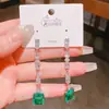 Déjame deslumbrarte con los mismos aretes de borla de circón verde pavo real de alta calidad y ecológicos para mujer, aretes de alta gama y exquisitos