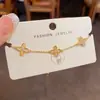 Moda Coreana y Japonesa Dulce Versátil Pulsera de Flor de Cuatro Hojas de Zirconia, Elegante Lujo Ligero Diseño Simple, Joyería Súper Brillante al por Mayor