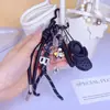 Sapatos Croc DIY Feitos à Mão Corda de Mão Fivela Pingente Miu Fofo Casal Chaveiro de Carro Bolsa Pequeno Pingente Atacado