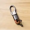 Cuerda Trenzada Simple con Hebilla de Pico de Águila Grabada con Láser Colgante Llavero de Coche Llavero Creativo con Hebilla de Herradura Venta al por Mayor