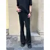 Pantalones lisos Cleanfit ligeramente acampanados para hombre, con estilo high-street, caída fluida y silueta favorecedora, perfectos para uso casual en otoño, y una opción versátil y moderna.
