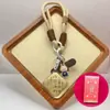 Regalo de Moda Paz y Alegría Llavero para Teléfono Móvil Colgante para Bolso Dibujo Animado Joyería Creativa Set de Caja de Regalo de Gama Alta