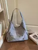 Bolso de hombro simple 2026 nuevo modelo bolso tote de gran capacidad bolso de mano para mujer bolso casual de axila para ir al trabajo
