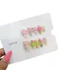 Uñas Artificiales Reutilizables Hechas a Mano Nai Zi Estilo Europeo y Americano B320 Estilo Fresco de Primavera con Base Transparente Nude y Puntas Verdes