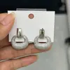 Novos Brincos de Diamante de Cobre da Primavera de 2024 Design de Moda Brincos Únicos para Mulheres Elemento de Luxo Leve Brincos