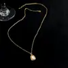 Colar Minimalista Geométrico de Concha Feminino Moda Commuter Estilo Levemente Luxuoso Colar Acessórios de Nicho High-End Corrente para Clavícula