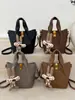 Bolso Cubo Retro Texturizado Estilo Coreano para Mujer Otoño e Invierno 2025 Nuevo Nicho Lujo Accesible Versátil Estilo Extranjero Bolso de Hombro Único Cruzado