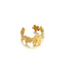 Anillos Europeos y Americanos Nuevos Más Vendidos Acero Inoxidable Galvanoplastia al Vacío Hojas de Oro de 18K Flores Turquesa Joyería de Mano Abierta Venta al por Mayor