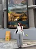 Toma real: Conjunto de dos piezas de punto color albaricoque, estilo puro y deseado, de ajuste ceñido, sin tirantes, con pantalones de pierna ancha drapeados y puños