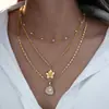 Collar en Capas con Colgante de Cadena de Perlas de Concha Transfronterizo Europeo y Americano Conjunto Ligero de Lujo Largo de Flor de 4 Piezas Cadena para Suéter