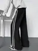 Pantalones de chándal a rayas con estampado de escamas de dragón para hombre, estilo americano de alta calle para otoño, pantalones casuales de pierna ancha, pantalones deportivos rectos holgados y fluidos de moda