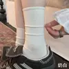 Calcetines de otoño para mujer, color blanco, algodón puro, hasta la mitad de la pantorrilla, calcetines largos sin costuras con puños holgados, calcetines postparto, nuevo estilo 2026, calcetines populares con volantes