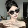 Gafas de Sol Retro Sin Montura Integradas de Textura Avanzada Ojo de Gato para Mujer Rostro Redondo Adelgazante 2025 Nuevas Gafas de Sol de Moda