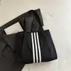Bolsa de lona grande capacidade estilo casual coreano 2026 para mulheres, nova bolsa de mão da moda para estudantes, bolsa tote adequada para aula e deslocamento