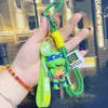 Terceira Geração Tartarugas Ninja Desenho Animado Chaveiro Pingente de Casal Celebridade da Internet Boneca Exquisita Chaveiro Pingente de Bolsa Venda por Atacado