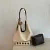 Bolso de hombro nuevo para mujer 2026 transfronterizo, bolso retro para el día a día, bolso grande de capacidad para llevar debajo del brazo, bolso tote para madre e hija