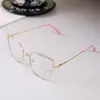 Monturas de gafas de moda transfronterizas europeas y americanas con decoración de diamantes de imitación, gafas fotocromáticas de ojo de gato para mujer de moda, anti-luz azul al por mayor