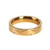 Anillo de Compromiso de Acero Inoxidable Nuevo Europeo y Americano con Diamante Anillo de Pareja Cruzado Rayado en Oro Joyería Personalizada de Moda