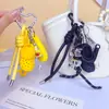 Sapatos Croc DIY Feitos à Mão Corda de Mão Fivela Pingente Miu Fofo Casal Chaveiro de Carro Bolsa Pequeno Pingente Atacado