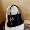 Bolsa de Mano Vintage Nueva Otoño 2026 Transfronteriza Bolso de Hombro de Moda Elegante Bolso Sencillo Casual Debajo del Brazo
