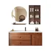 Tocador de baño de cerámica de color nogal estilo mid-century con lavabo integrado y espejo redondo